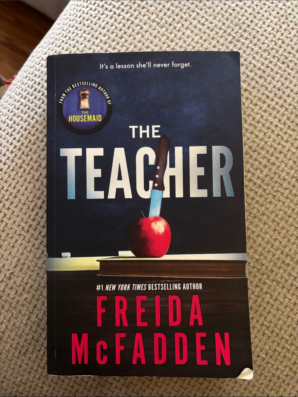 The Teacher Paperback - Black Cover with Red Accent